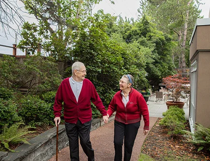 couple in red walking